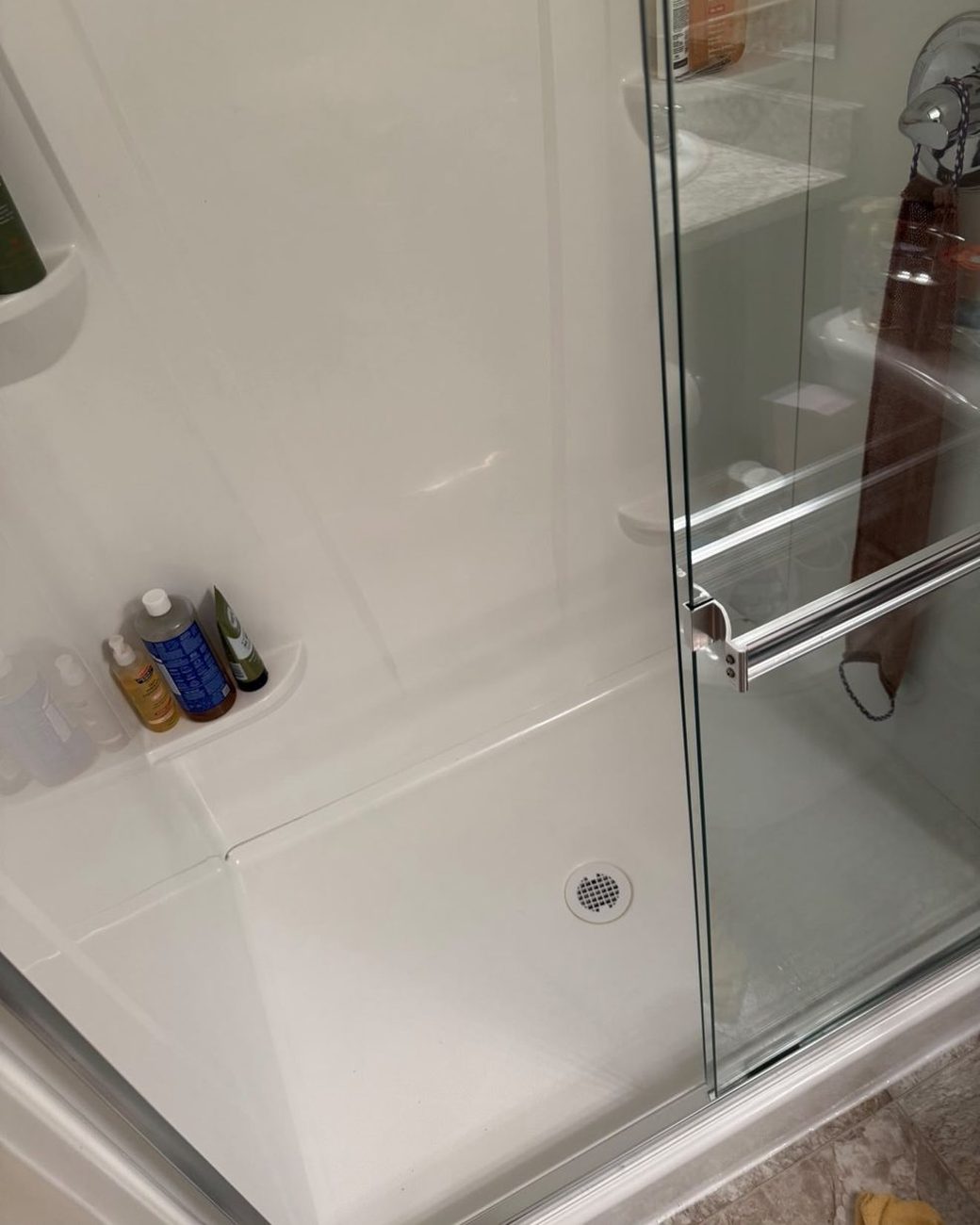 Shower door and pan after cleaning, crystal clear glass