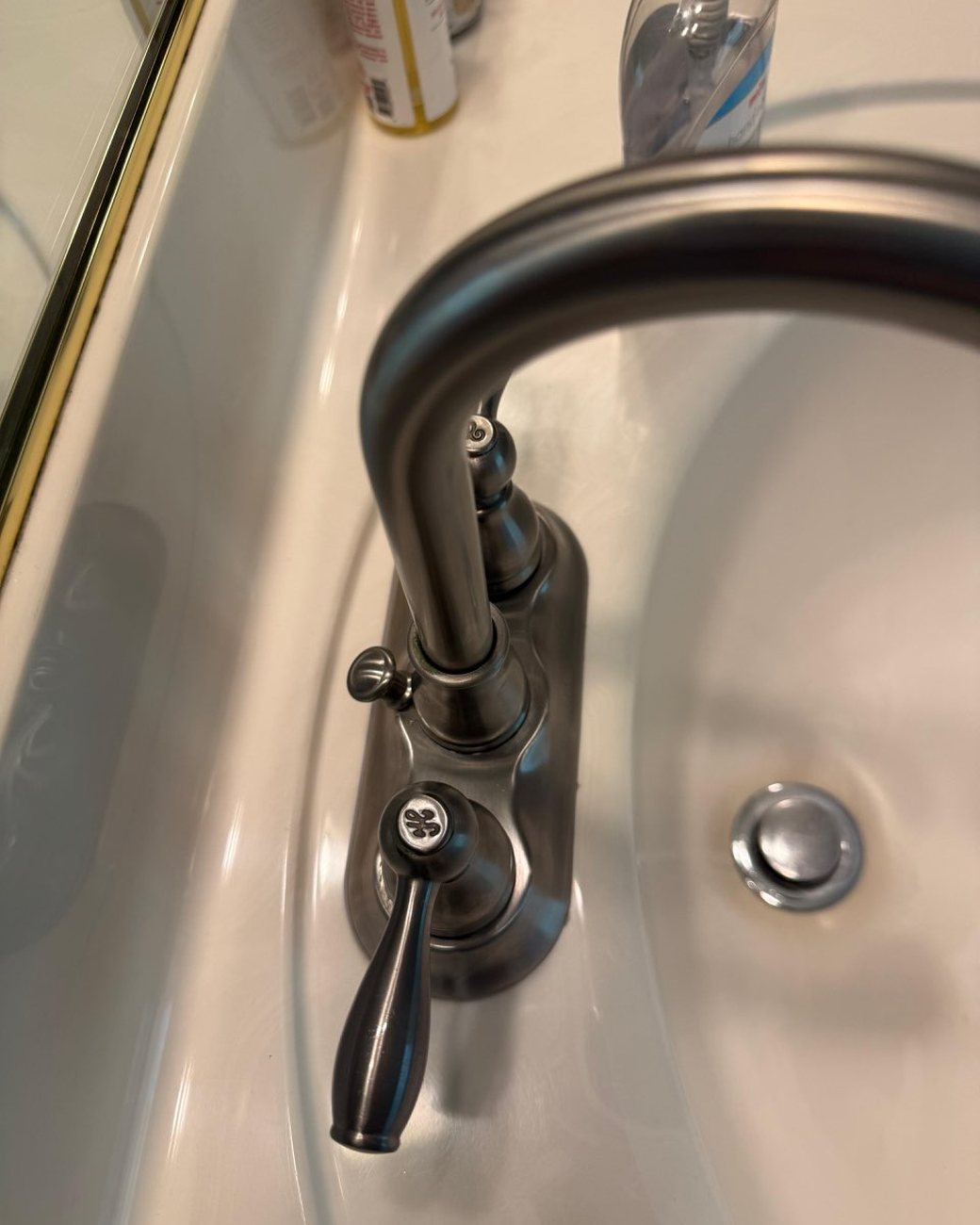 Sink faucet after cleaning, polished and shining