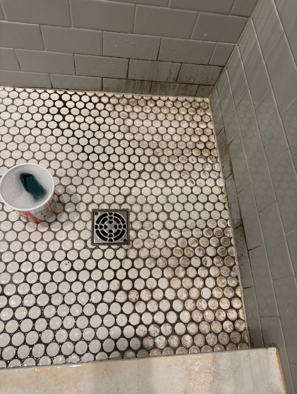 Grimy tile floor before cleaning