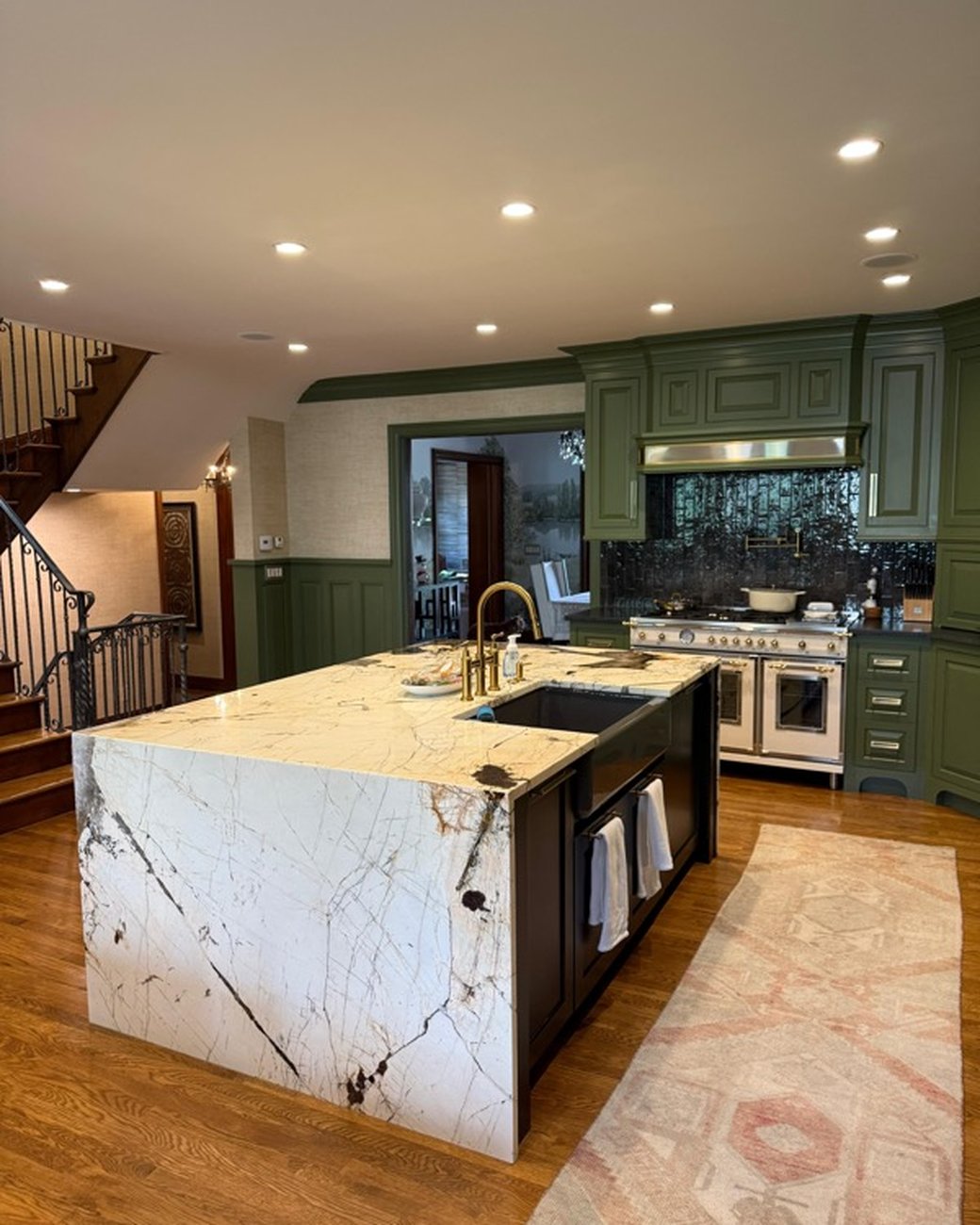 Sparkling kitchen with marble island after cleaning