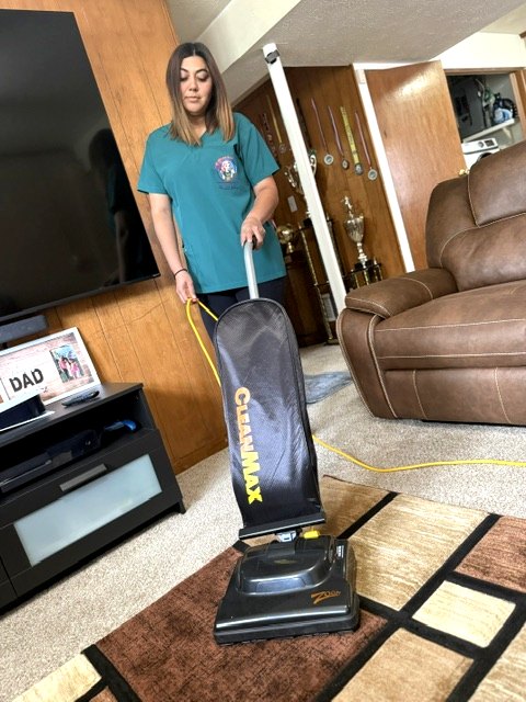 Yesenia, owner of A Magic Touch Cleaning Services, cleaning a home in Columbus